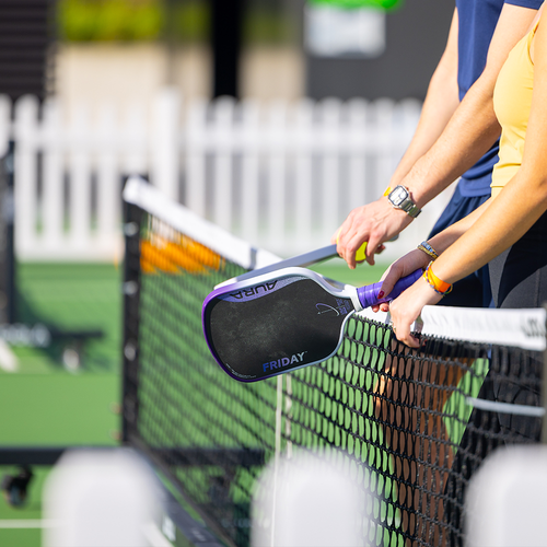 Friday Aura Gen 4 pickleball paddle on court, action shot