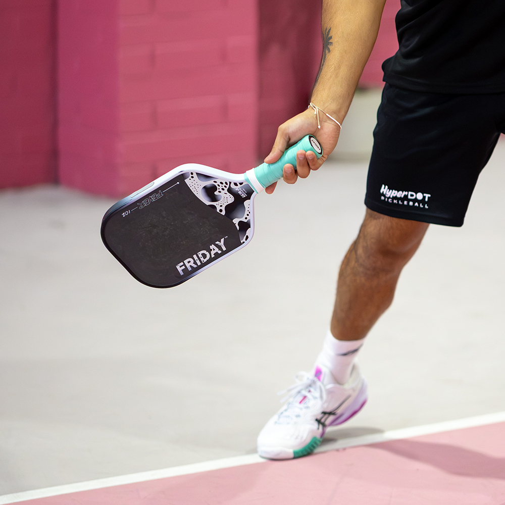 Matias playing with the Friday Fever 102 pickleball paddle in Snow